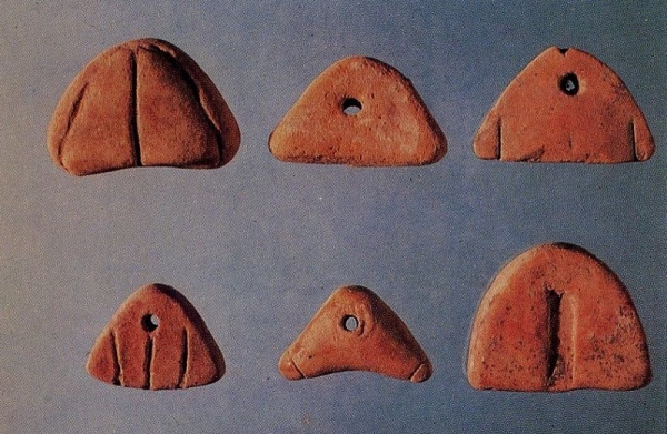 Triangle tokens from Susa dating to approximately 5500 B.P.